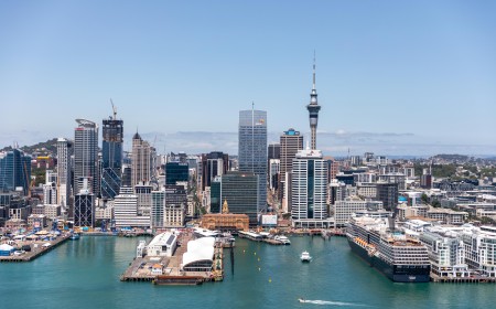 Auckland City with cruise ship docked Shed 10 in the foreground with PWC and ANZ Towers in front of Skytower v2